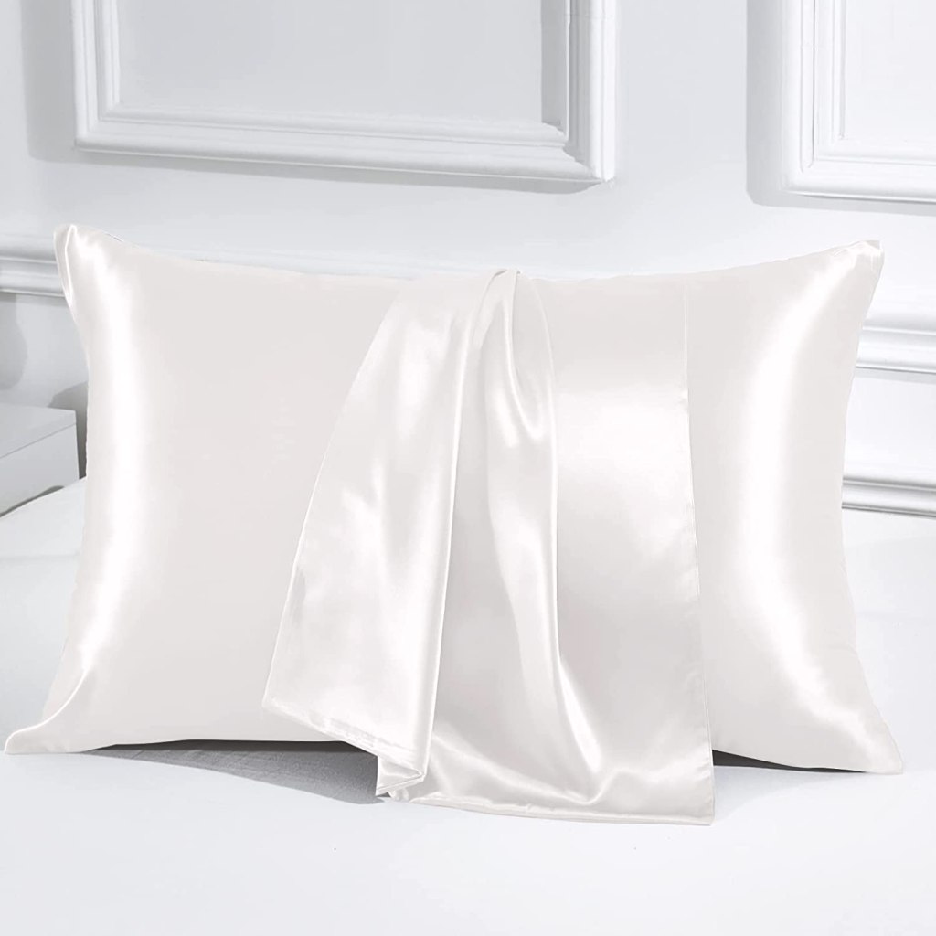 silk white pillowcases on a pillow with elegant wall background, a great gift idea for mom on Mother's Day