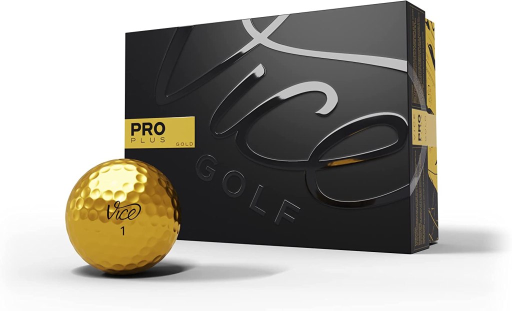 gold golf ball and black box packaging