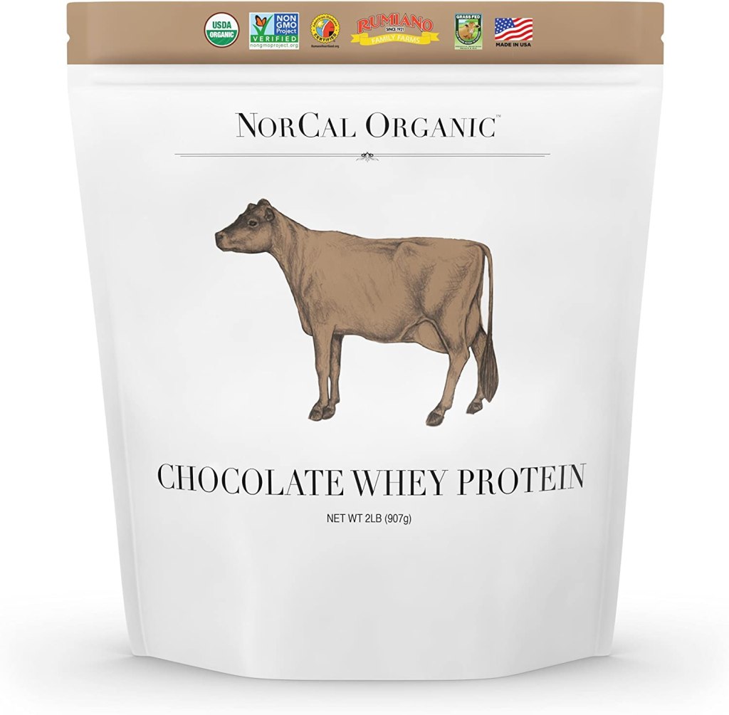 white opaque ziplock style bag with whey powder inside. Elegant illustration of a cow on outside, a great gift for mom 
