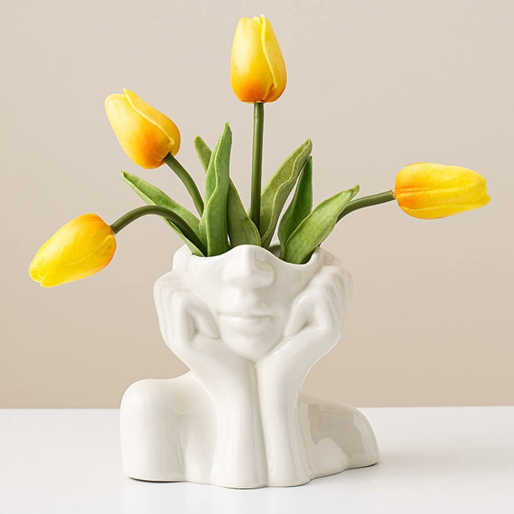 flower arrangement ceramic face sculpture vase