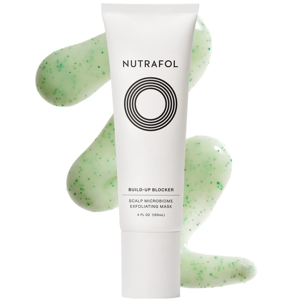 white elegant standing tube with green scalp mask inside